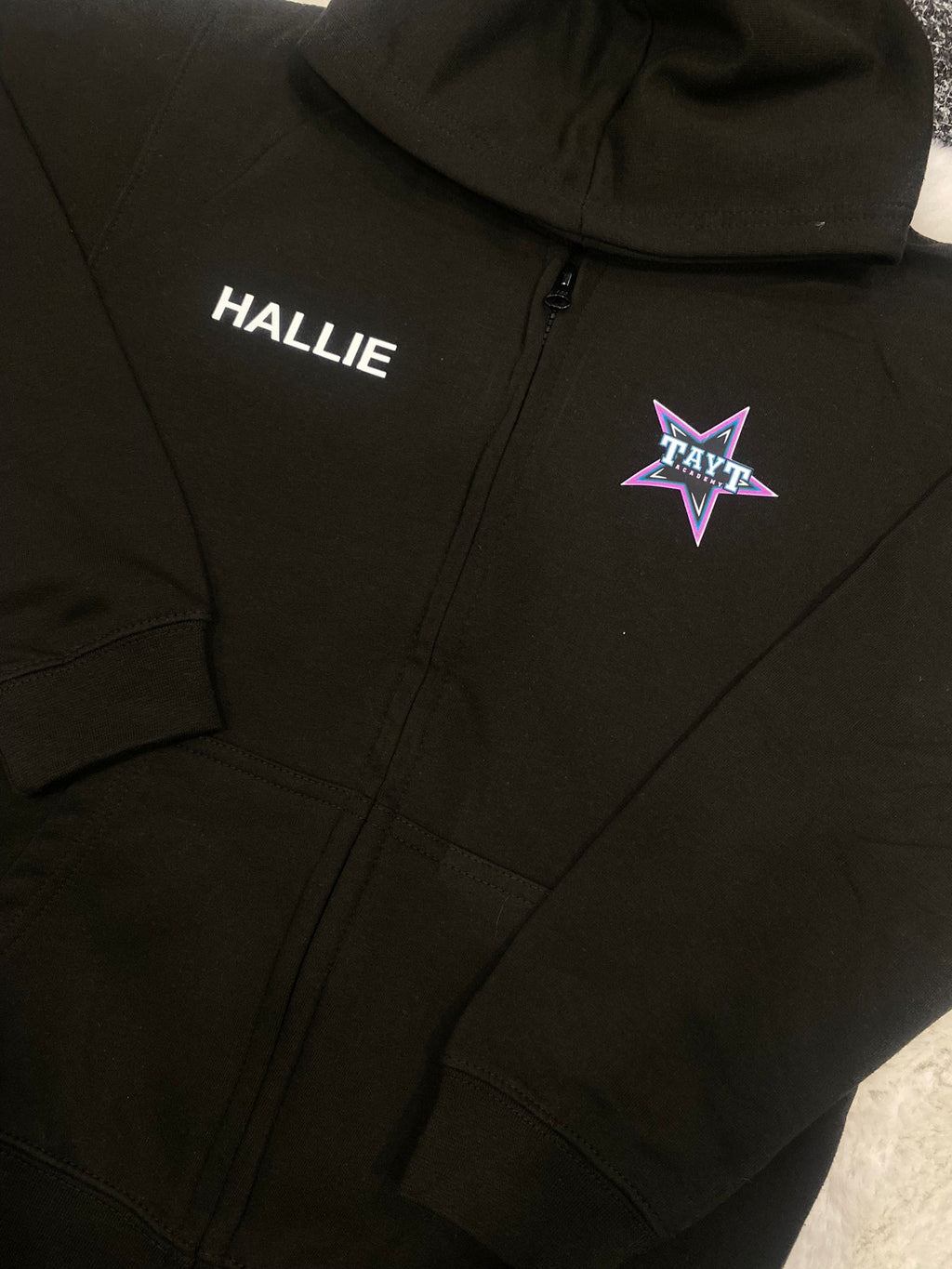 Tayt Black zip up hoodie with left chest logo and large logo on back