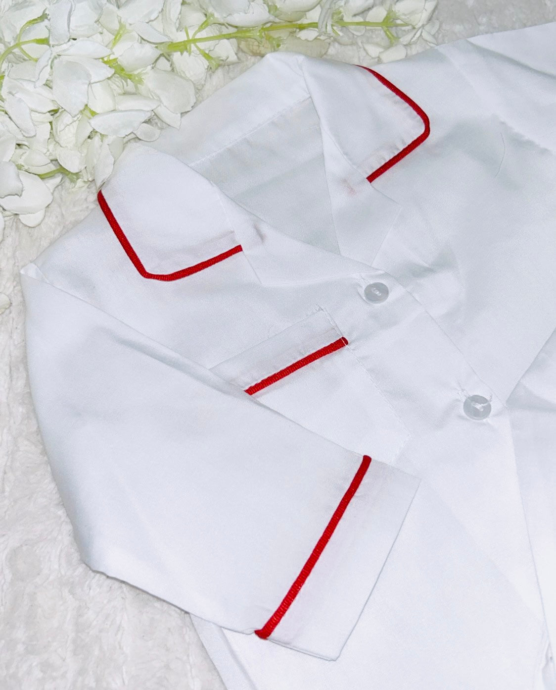 White Pyjamas with Red Piping